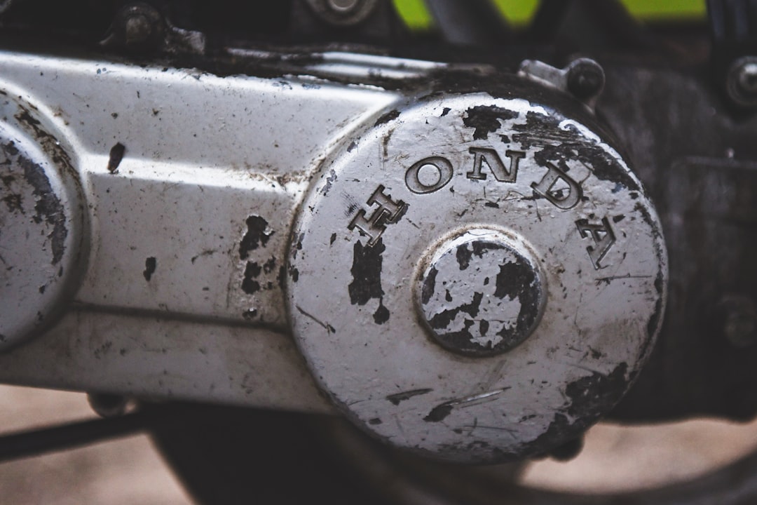 Close-up of a worn motorcycle engine casing