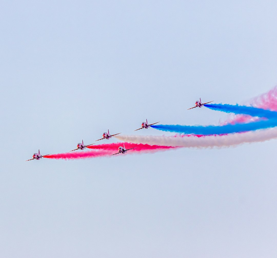 a group of airplanes flying in formation in the sky