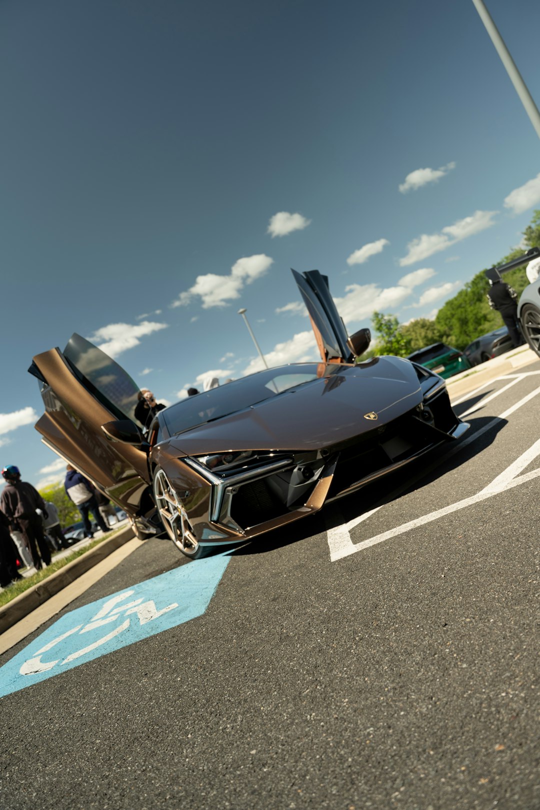 A sleek, modern sports car with doors open.