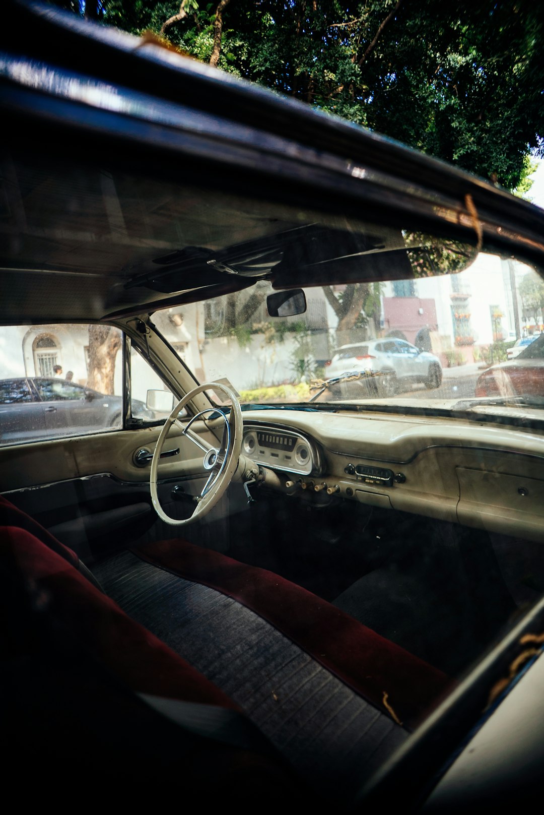 a car with a steering wheel and a dashboard