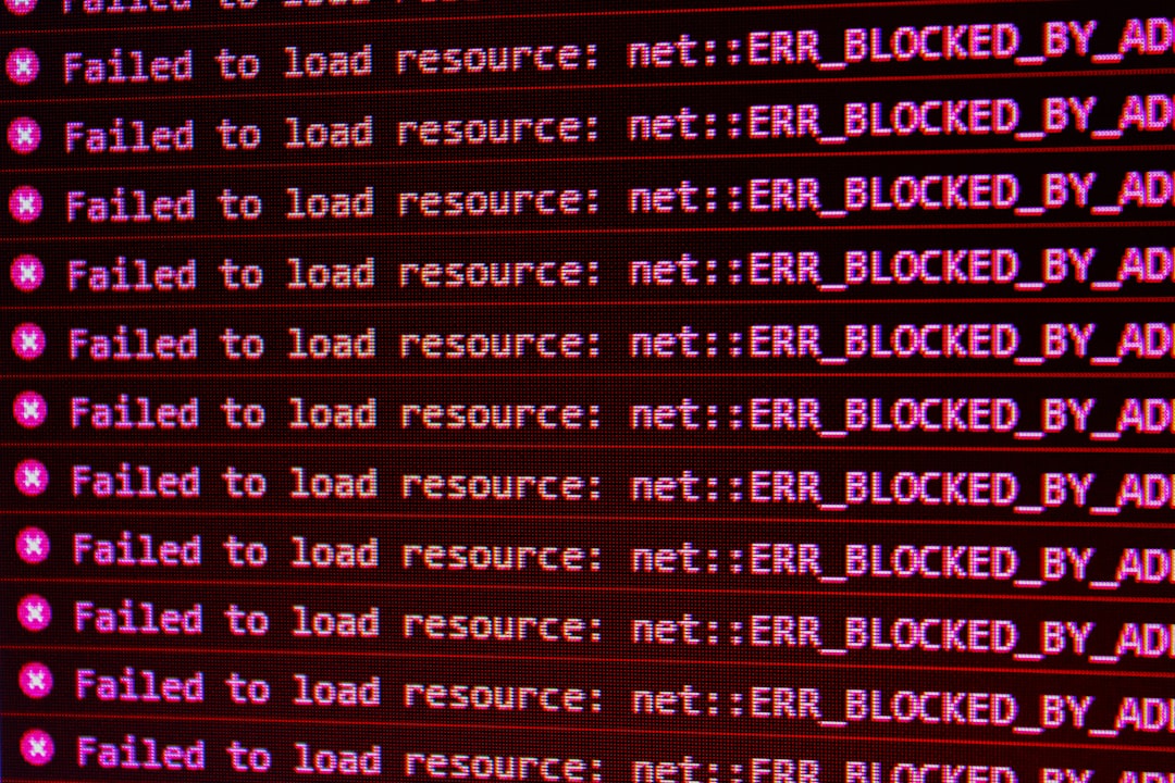 Red error messages on a black computer screen indicating blocked web resources