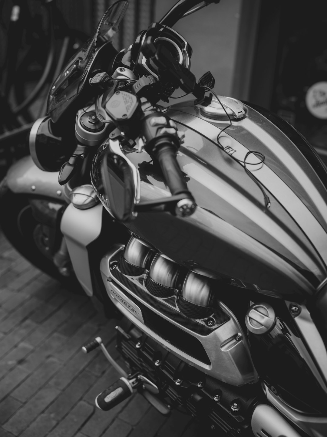 Close-up of a vintage motorcycle engine and handlebars