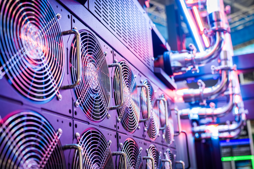 Close-up of server cooling fans in a vibrant data center