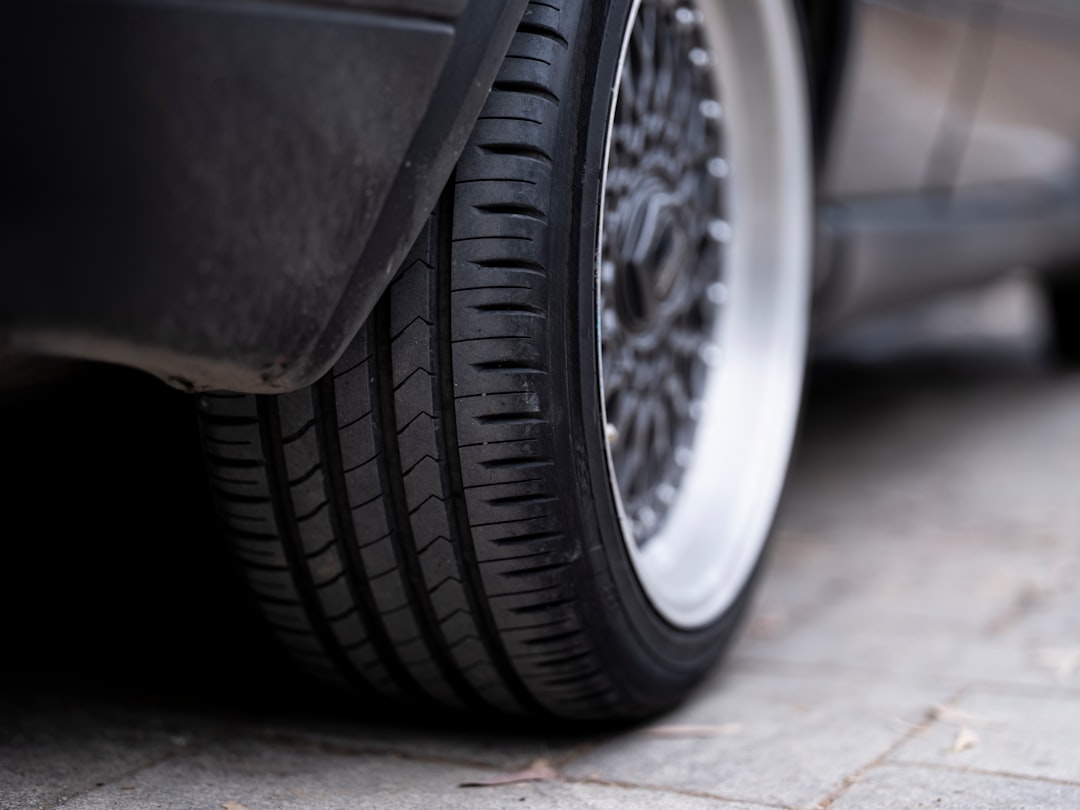 a close up of a tire on a car