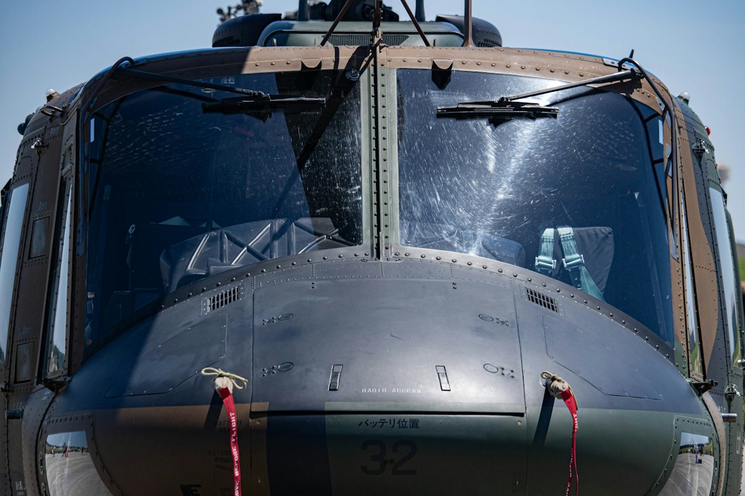 a close up of the front of a military helicopter